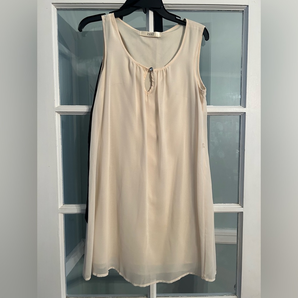 Cream colored dress with optional black tie around